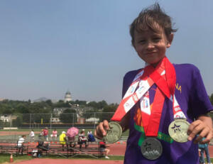 Dylan with medals