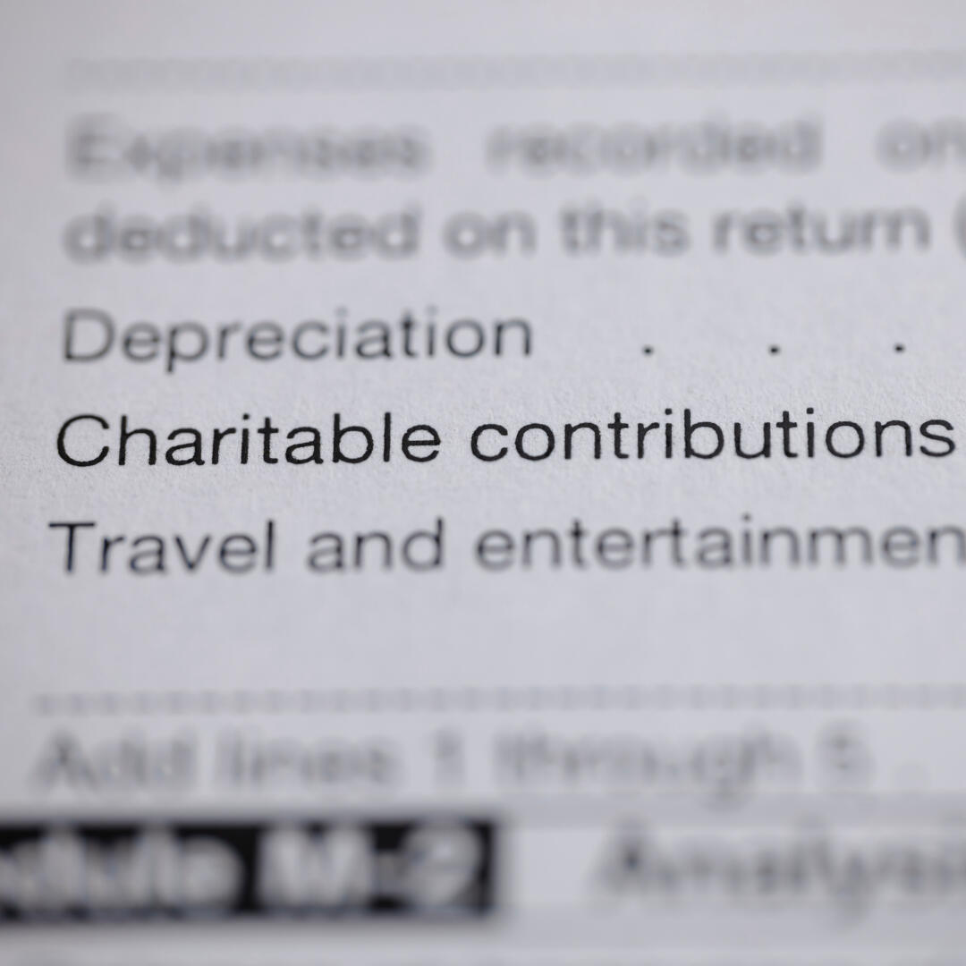 People hands throwing coins in piggy bank for crowdfunding